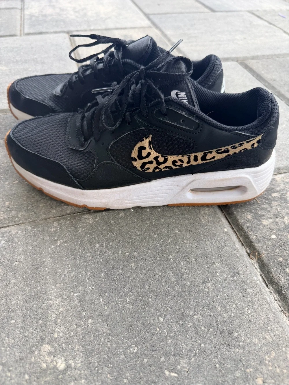 Nike Women's Black Sneakers with Leopard Print Swoosh